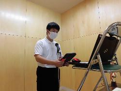 全校集会（生徒会長からのリーダーズセミナー報告）