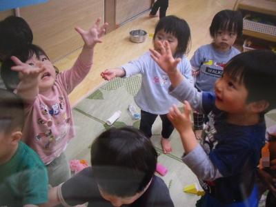 投げる